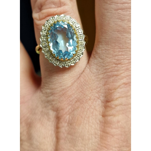 20 - 9ct Gold, Blue Topaz & Diamond Dress Ring w/0.5ct of diamonds - 5.2g & size P