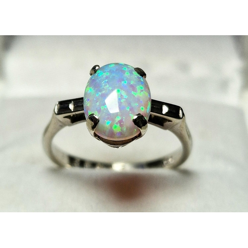 54 - 9ct White Gold Opal Set Ring, Size N and Weighs 2.4g approx