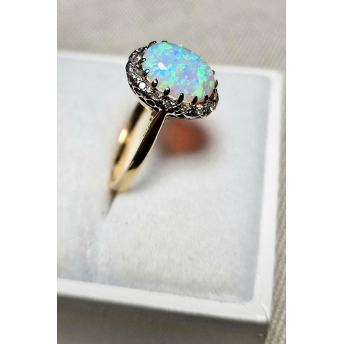 56 - 9ct Gold, Opal & Diamond Dress Ring. Size K and weighs 2.9g approx