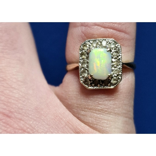 58 - 9ct Gold, Opal & Diamond Dress Ring. Size K and weighs 2.9g approx