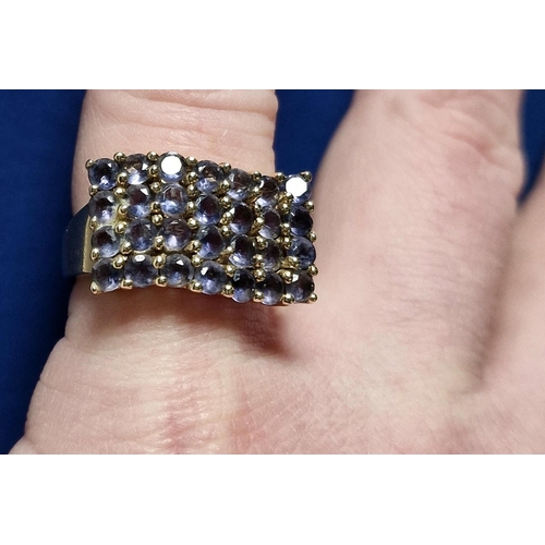 67 - 9ct Gold & Tanzanite Cluster Ring, Size O and weighs 5.9g approx