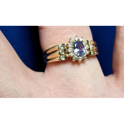 69 - 14ct Gold, Sapphire & Diamond Cluster Ring, Size R and weighs 3.9g