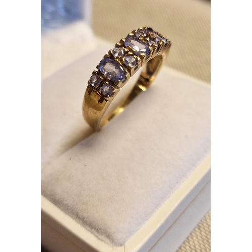 69a - 9ct Gold & Pale Tanzanite Large Half Eternity Ring, 3.1g & size O+0.5