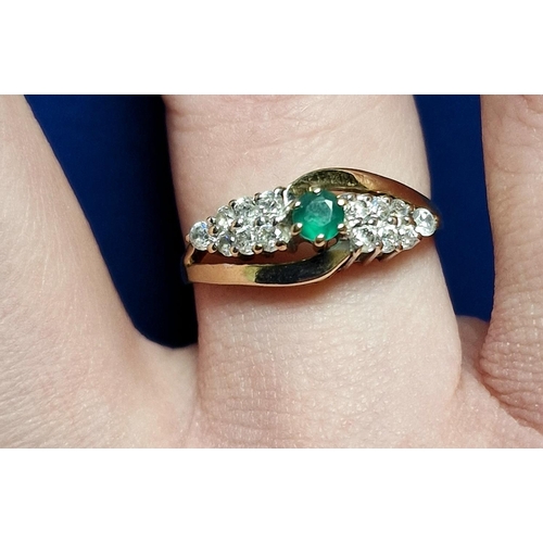 93 - 9ct Gold & Emerald Cluster Ring, Size Q and weighs 3.1g approx