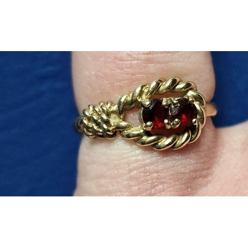 170 - 9ct Gold & Triple Garnet Knot Ring - size L & 2.1g