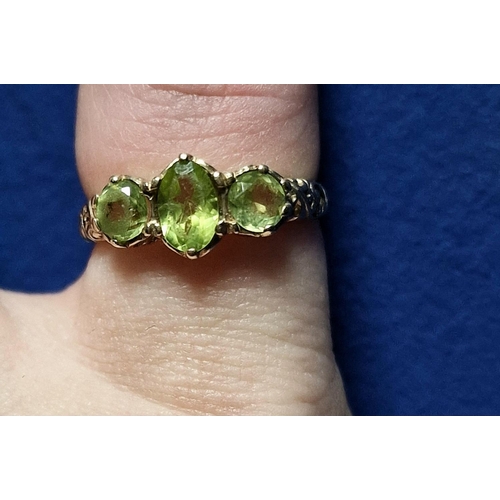 218 - 9ct Gold and Triple Peridot Dress Ring, size J+0.5 & 2.1g