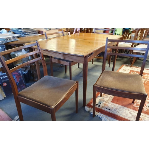 132 - G-Plan Kofod Larsen Extending rectangular Table in teak, accompanied by 4 chairs in original velvete... 