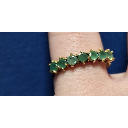 169c - 9ct Gold & Seven Emerald Half Eternity Ring, size N+0.5