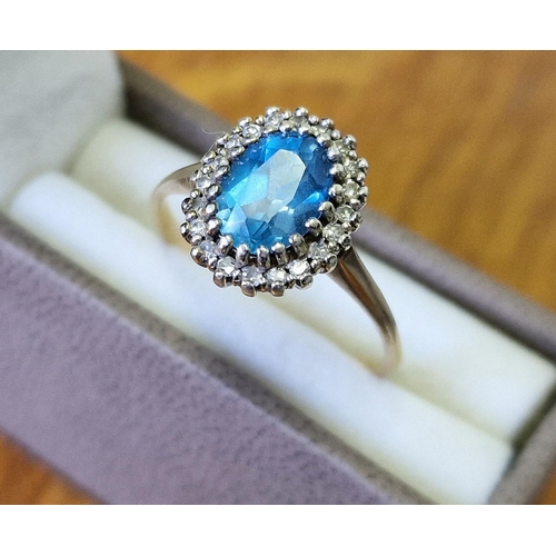 174h - 9ct Gold, Diamond & Blue Topaz Dress Ring (Princess Diana Style), 2.7g & size O