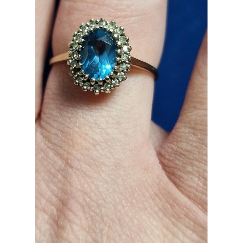 174h - 9ct Gold, Diamond & Blue Topaz Dress Ring (Princess Diana Style), 2.7g & size O