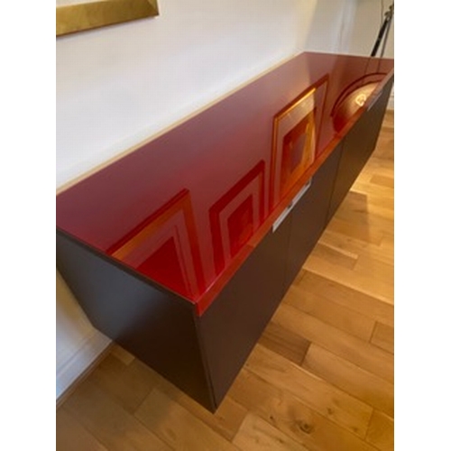 68f - Vintage Designer Sideboard w/Italian provenance and solid red glass top and a part steel base framew... 