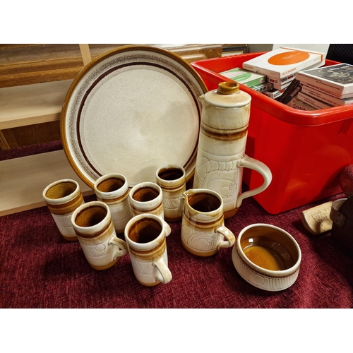 23v - A Celtic Pottery (Newlyn) coffee set, comprising 6 mugs, creamer and sugar bowl, coffee pot and plat... 