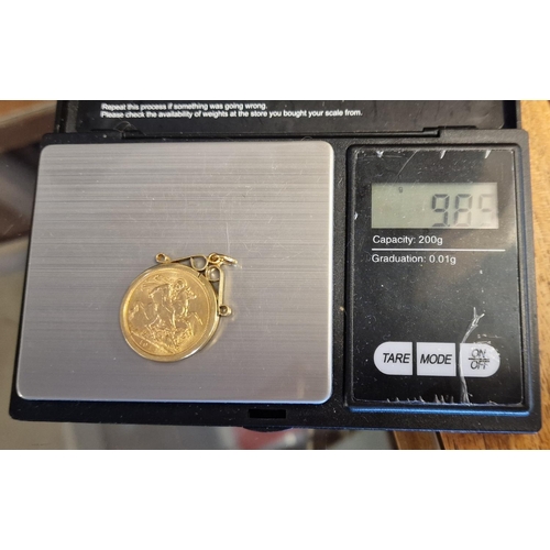 67 - 22ct Gold Sovereign Coin - dated 1912 w/mount - total weight 9.85g