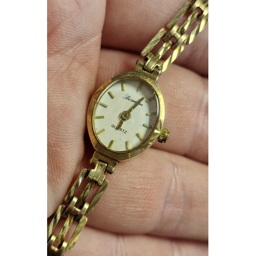 120 - 9ct Gold Sovereign Cocktail Watch + 9ct Strap - combined weight 8.55g