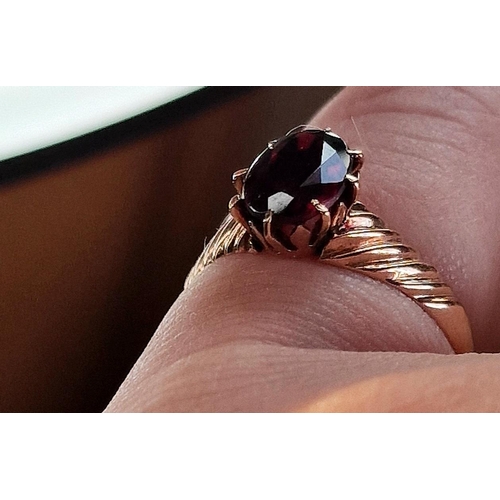 214 - 9ct Gold & Garnet Dress Ring, size M