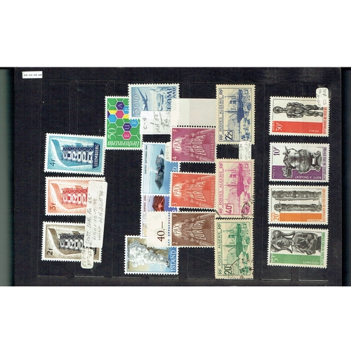 15 - Small stockbook of mainly unmounted mint, and mint sets including Finland 1950 Air 300m, Jordan 1952... 