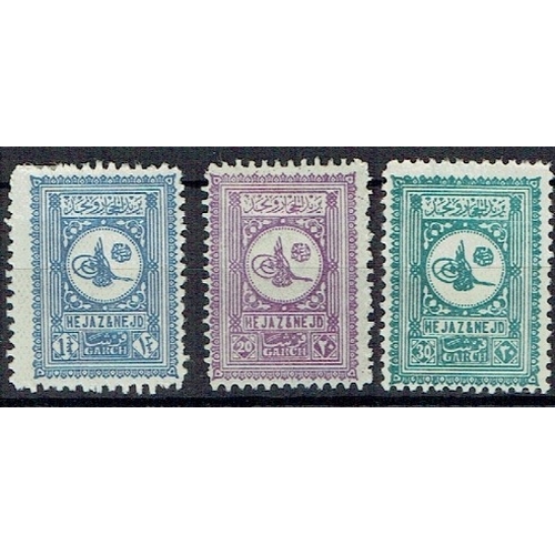 1136 - SAUDI ARABIA - 1929 Set of three 1óg blue, 20g violet and 30g green mounted mint with hinge remains,... 