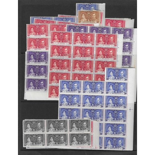 16 - OMNIBUS - 1937 Coronation sets in unmounted mint blocks including Fiji (blks of 12), Jamaica (blks o... 