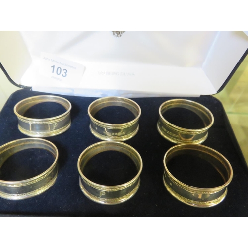 103 - Cased set of 6 London silver Napkin Rings