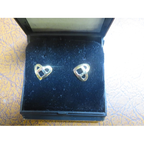 85 - Pair of 18ct. Gold Heart shaped Earrings