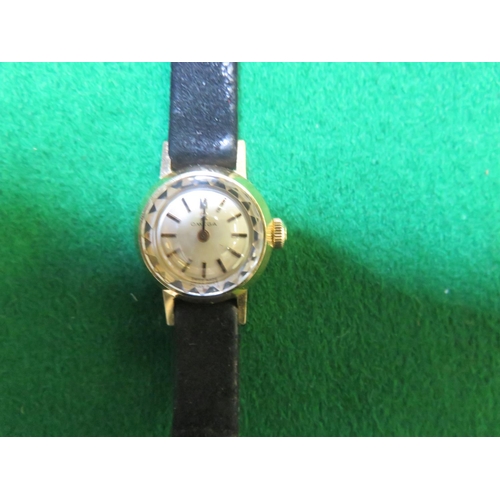 87 - Ladies Dress Omega Wrist Watch with leather strap