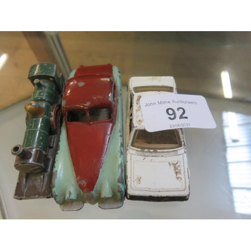 92 - Dinky Model Jaguar, Matchbox Ford, and one other