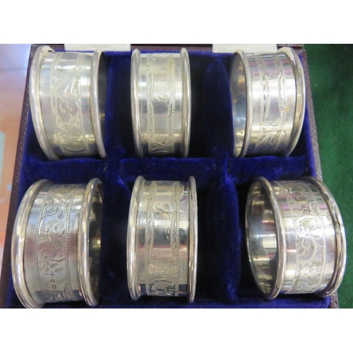 99 - Cased set of 6 London silver Napkin Rings