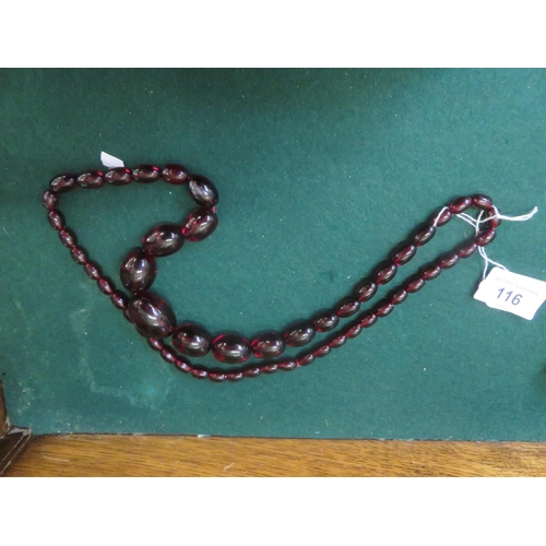 116 - String of Cherry Amber Style Beads