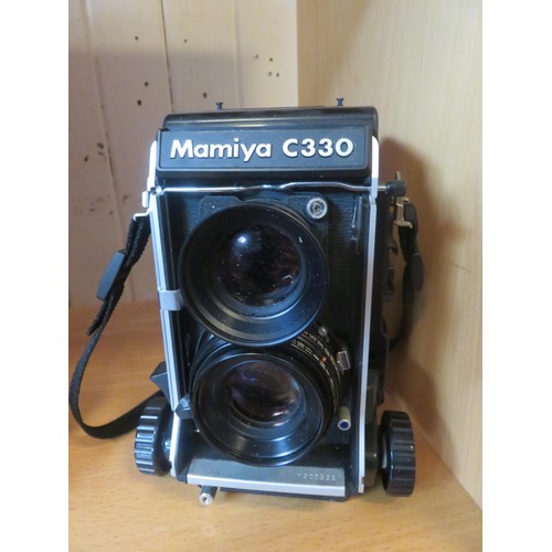 147 - Two odd Mamiya Cameras