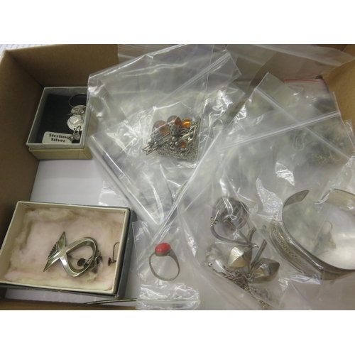 89 - Large assortment of Silver and Amber Jewellery