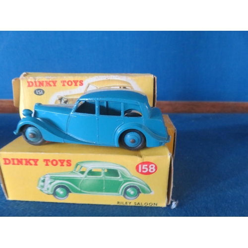 107 - Three boxed Dinky Model Saloon Cars