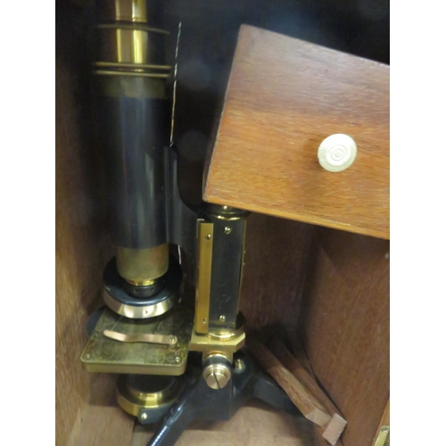 249 - Cased Microscope