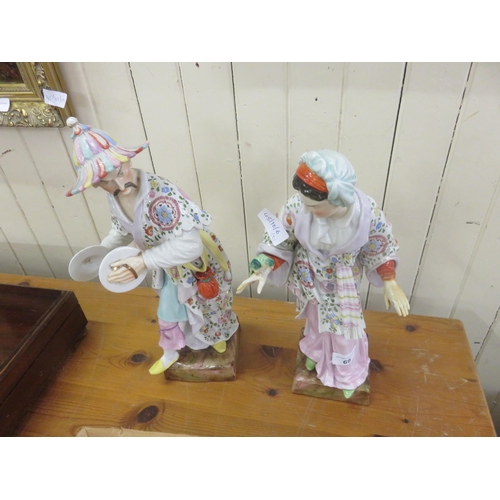 69 - Two German made Figures of an Oriental Couple