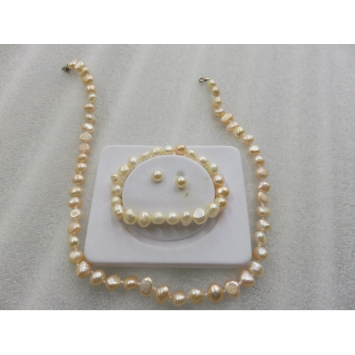 87 - Boxed Pearl Necklace, Bracelet and matching Earrings