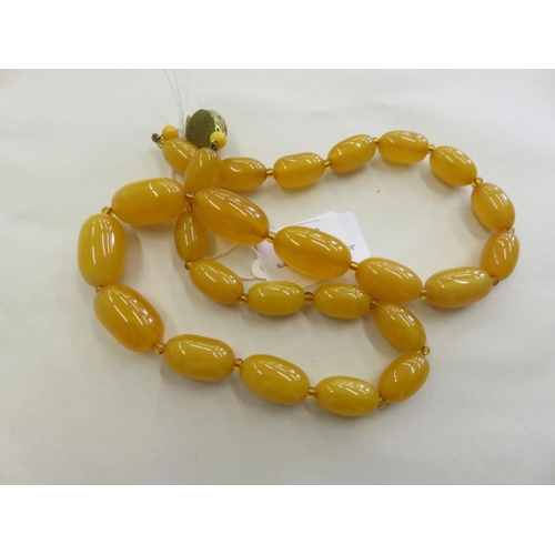 69 - String of Amber Style Beads