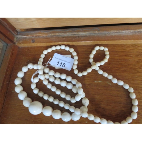 110 - Long Antique Graduated Necklace