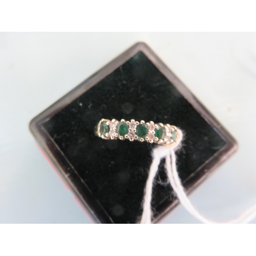 98 - 9ct Gold Emerald and Diamond Chip Ring