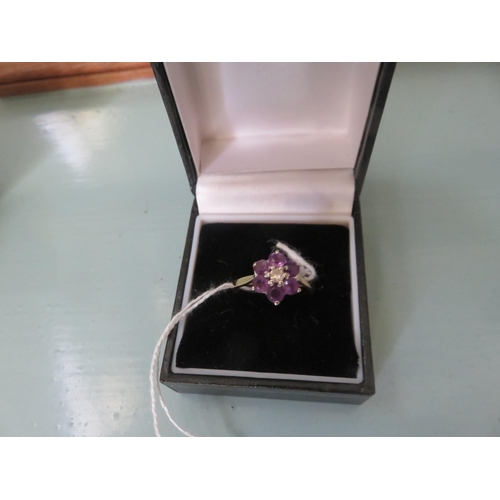 99 - 18ct. Gold Diamond Amethyst Ring