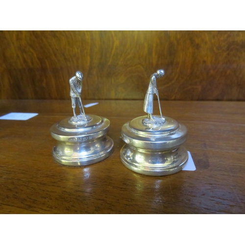 39 - Pair of Silver Paperweights with Golfing Figures