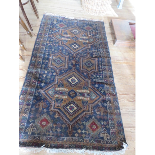 408 - Fringed Rug on Blue Ground With Two Large and Two Small Centre Medallions 78