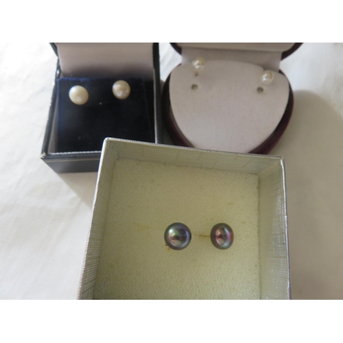 69 - Three pairs of Pearl Stud Earrings