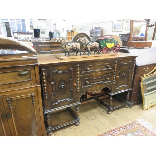 463 - Carved Oak Sideboard with Two Panel Doors