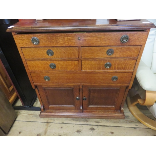 498 - Oak six drawer, two door Cabinet