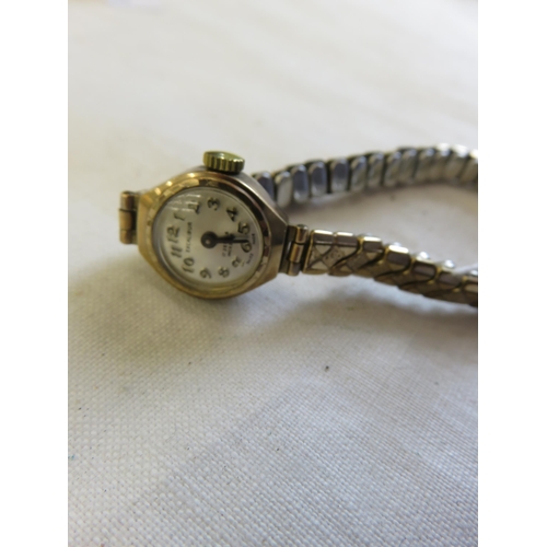 153 - Lady's Escalibar 9ct. Gold Face Watch