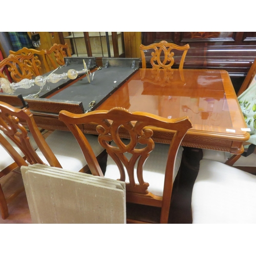 483 - Mahogany Pedestal Dining Table, two leaves and ten matching Chairs