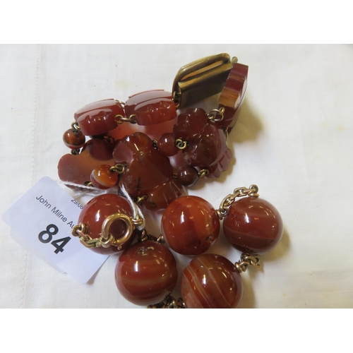 84 - Two Polished Red Stone Bracelets