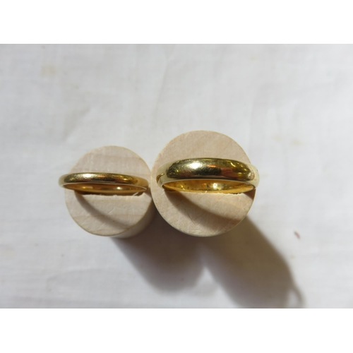 97 - Two 18ct Gold bands - 6.8gms