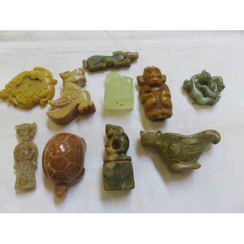 278 - Ten Carved Jade Style Pieces