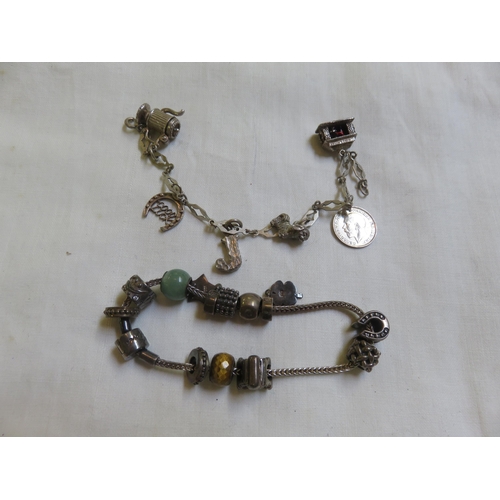 117 - Rhona Sutton Silver Charm Bracelet and another