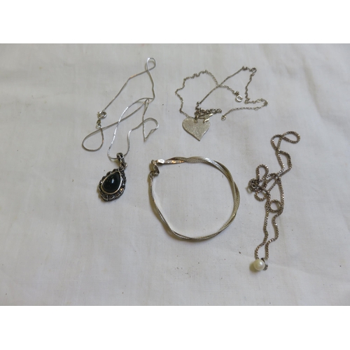 123 - Three Pendants and Bracelet